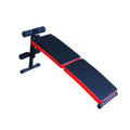  Adjustable foldable weight bench stored vertically next to a stylish wooden table with decorative items.
