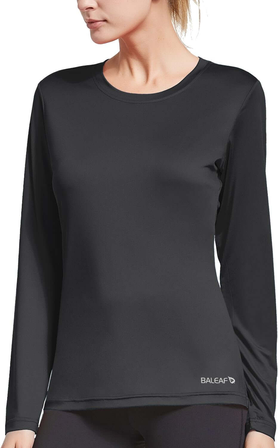 Back view of women's quick dry workout top in black, showcasing long sleeves and stylish design.